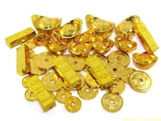 lingotes y monedas de oro como amuletos de la suerte